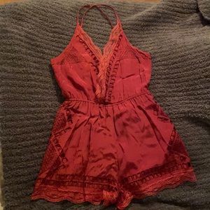 Tularosa Romper. 100% viscose. Maroon Romper. Lace. Size small.